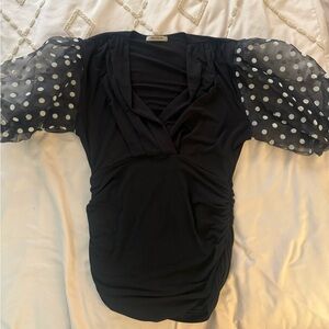 Elegant Black Top with Sheer Polka Dot Sleeves